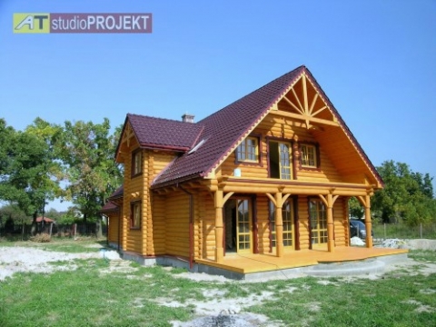 Projekt domu drewnianego z bala z garażem dwustanowiskowym